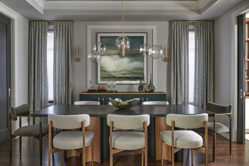old money aesthetic dining room with gold accents and artwork
